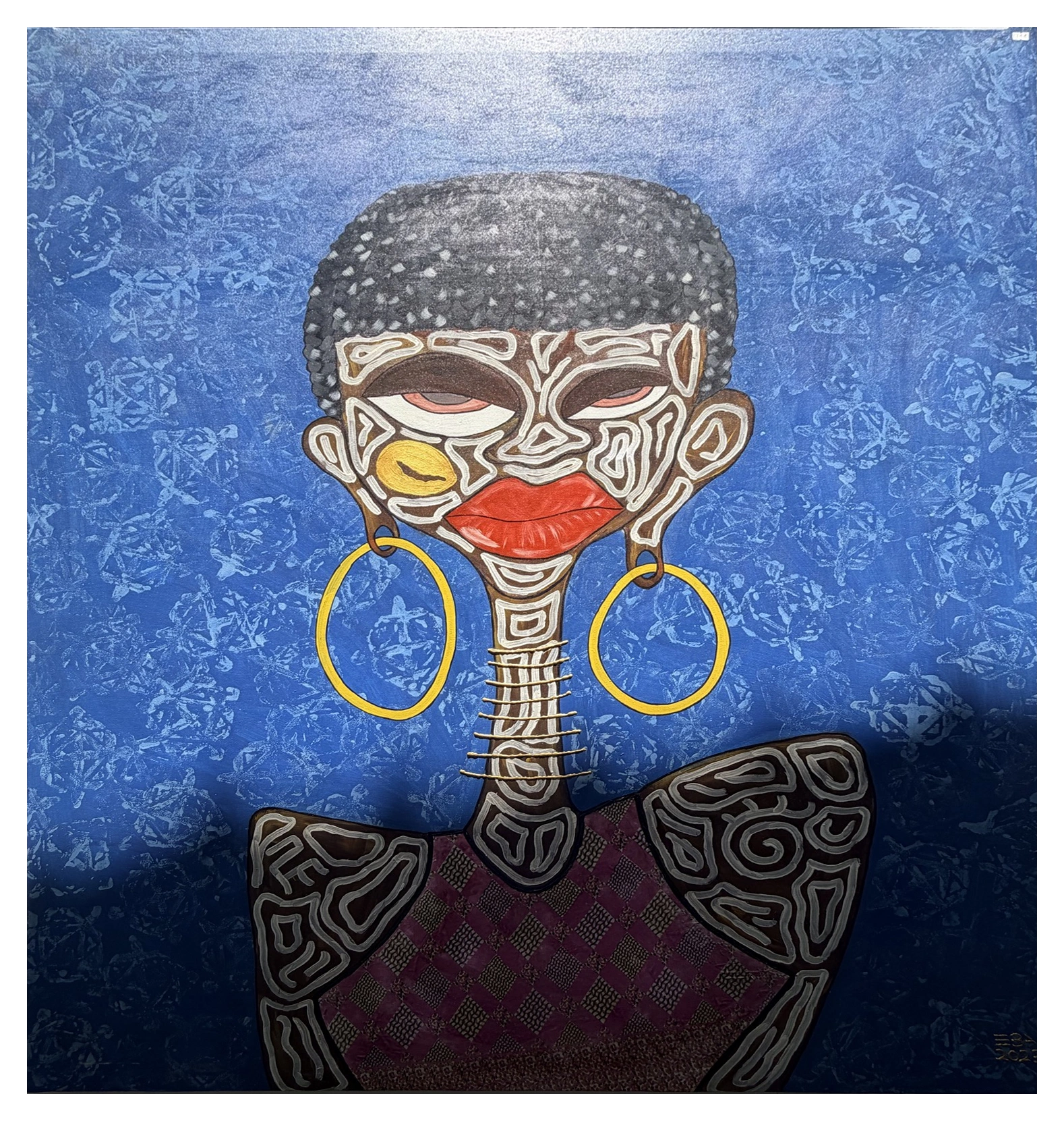 Collection photograph: portrait with gold hoops.
