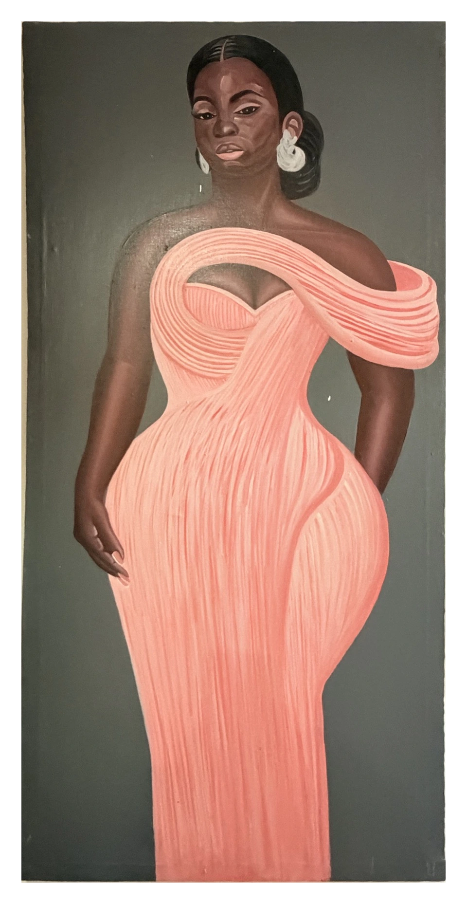 A standing figure in a rose-pink dress against a dark background.